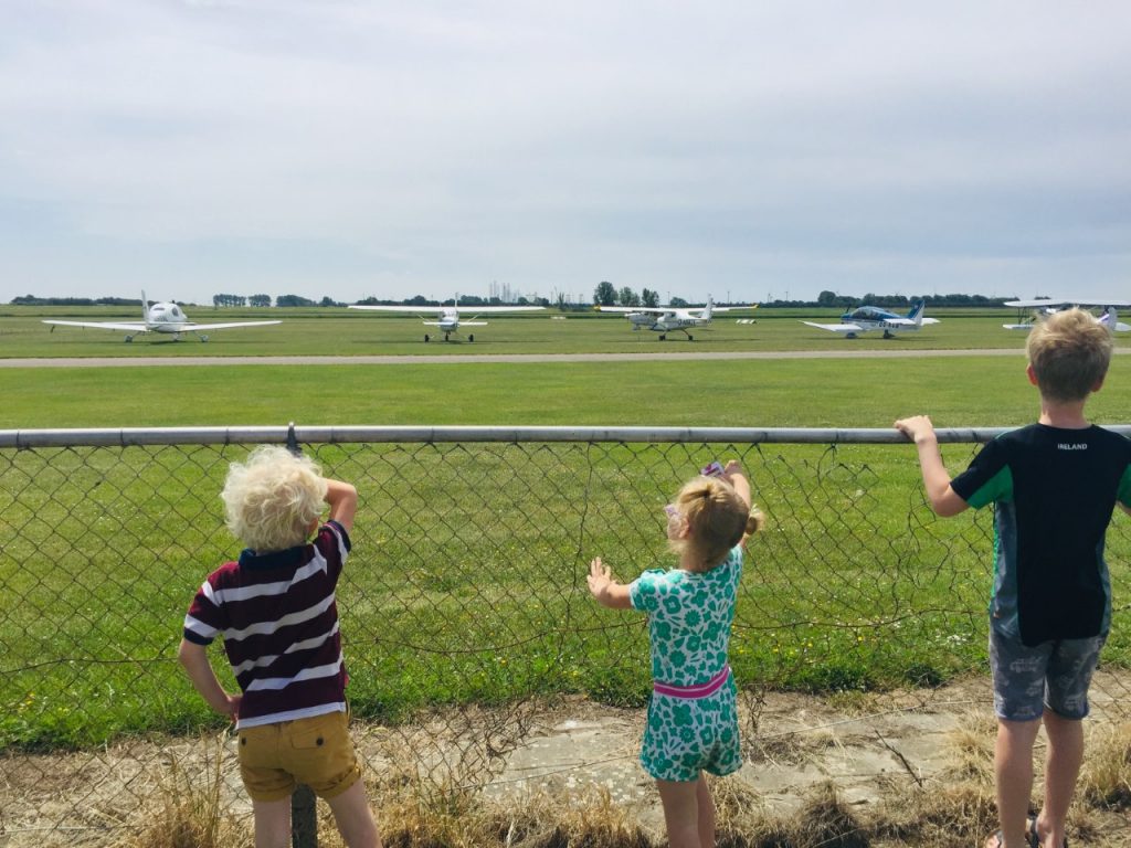 Children Watch Planes