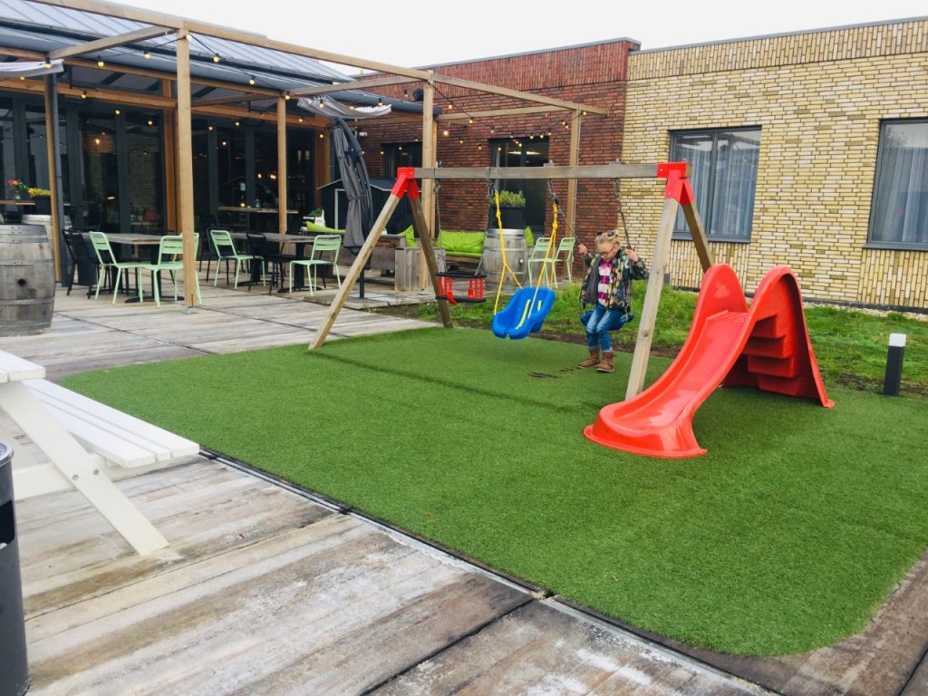 Swings and Slide At GuestHouse Hotel